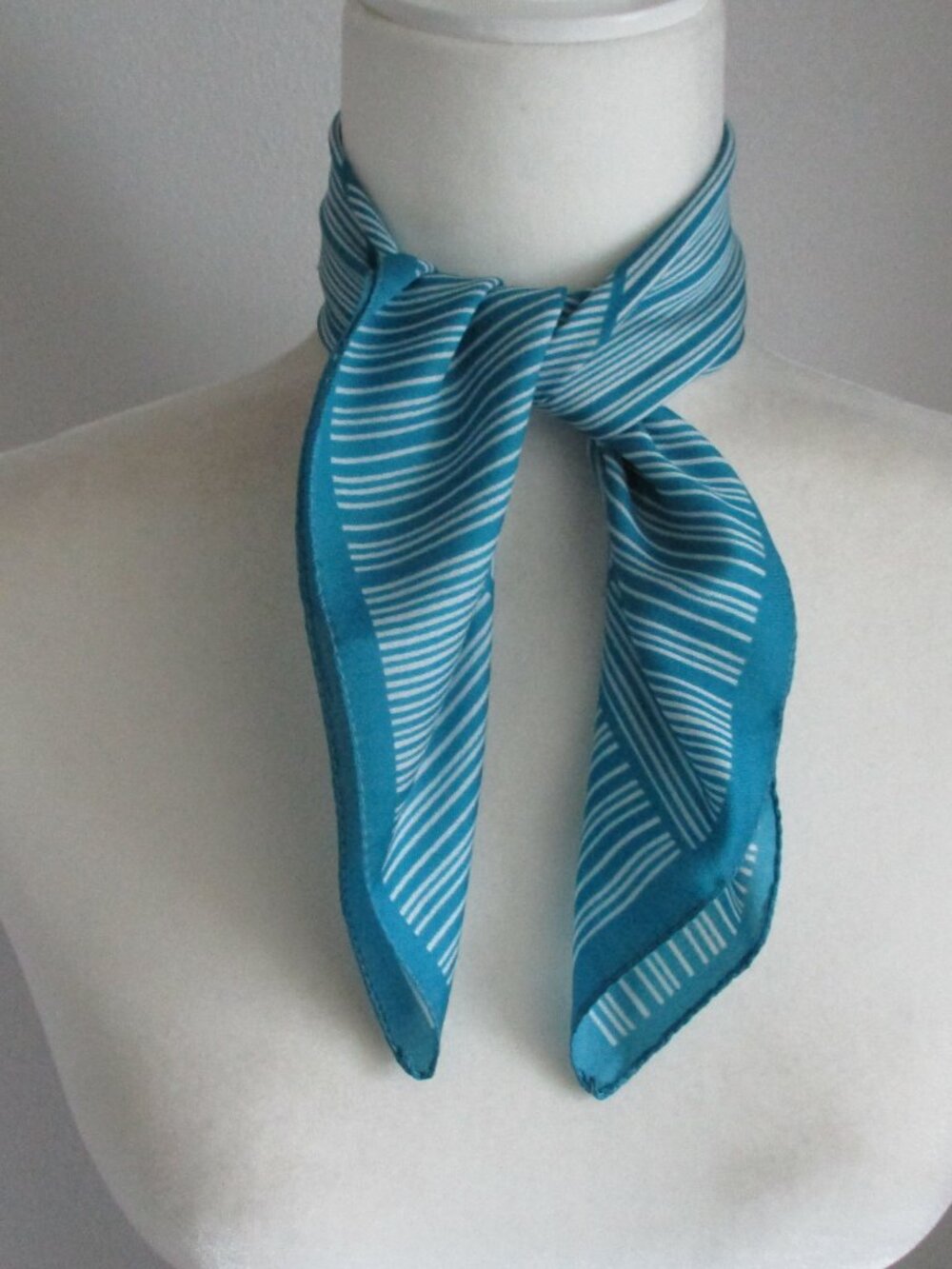Turquoise & white striped scarf